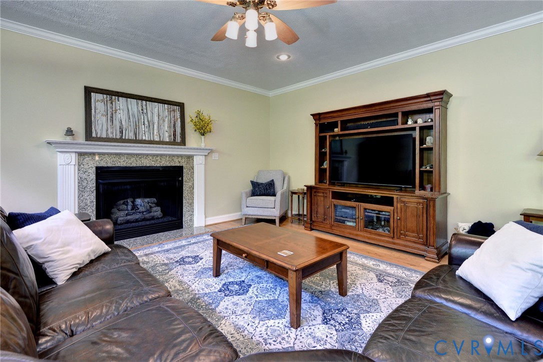 4015 Cold Spring Road Williamsburg, VA 23188 - Photo 10 of 57 Living area with wood-finish flooring, a ceiling f