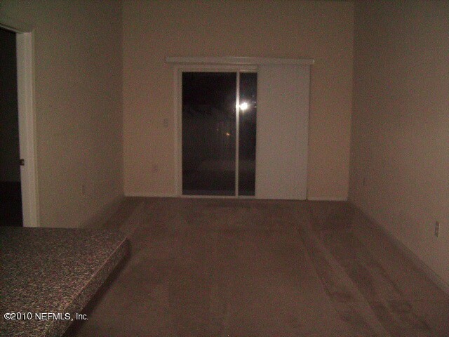 7920 Merrill Road, Unit 506 Jacksonville, FL 32277 - Photo 2 of 11 LIVING ROOM