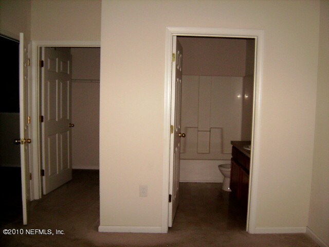 7920 Merrill Road, Unit 506 Jacksonville, FL 32277 - Photo 7 of 11 MASTER BED ROOM CLOSET