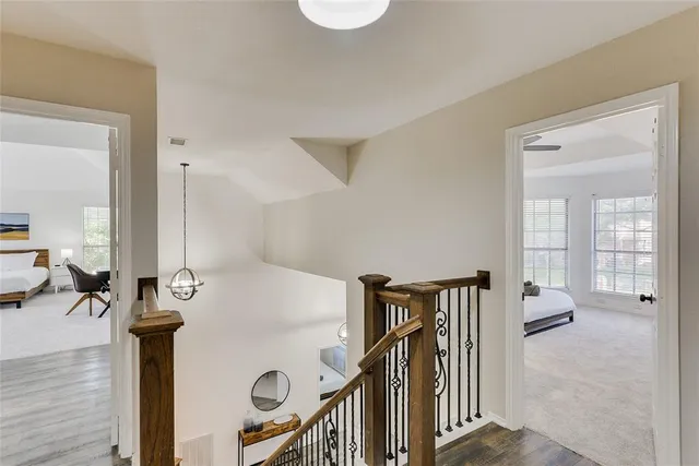 a view of a hallway with workspace