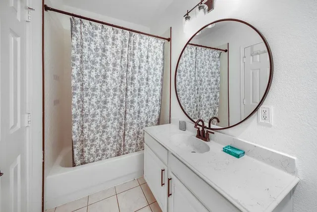 a view of a roof deck with wooden floor and fence