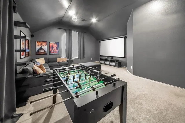 a view of a chairs and table in patio