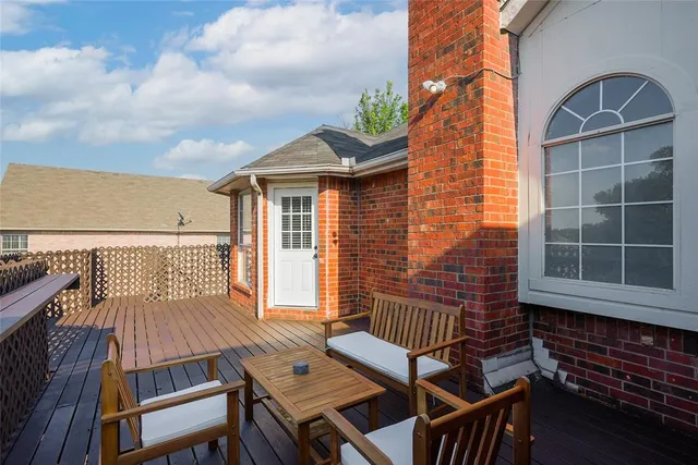 a view of a swimming pool with a patio