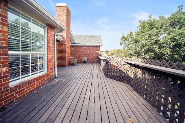 a view of a swimming pool with a yard