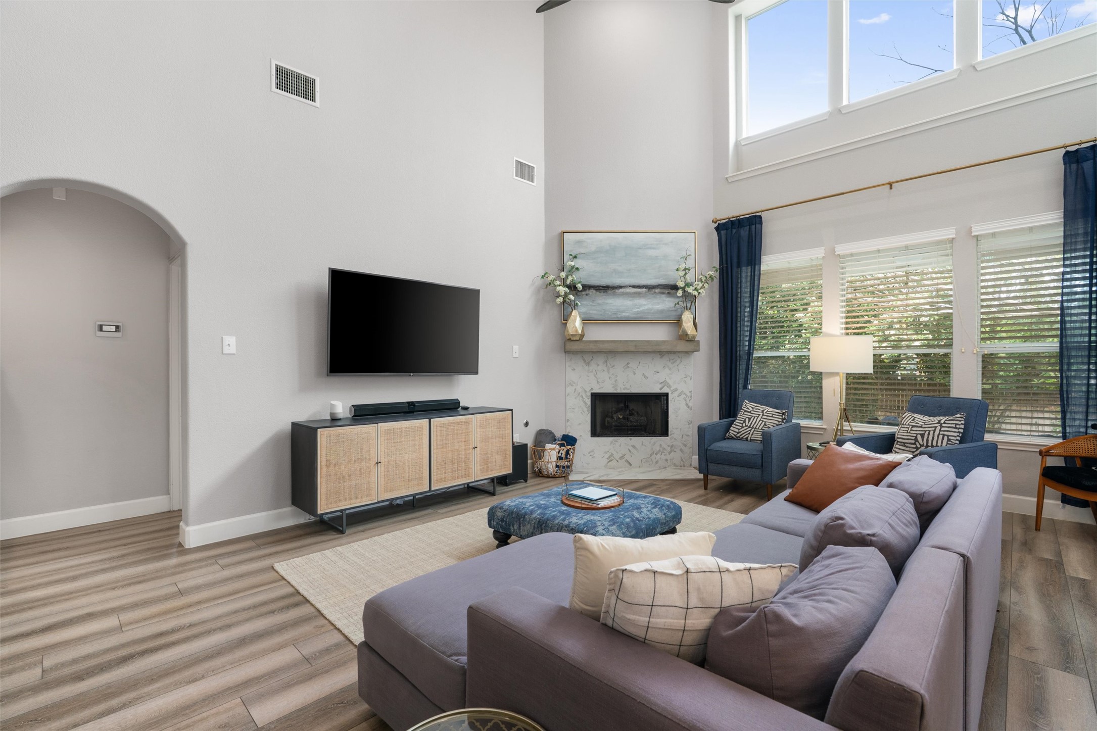 144 Copper Lake Lane Georgetown, TX 78628 - Photo 11 of 39 a living room with furniture and a flat screen tv