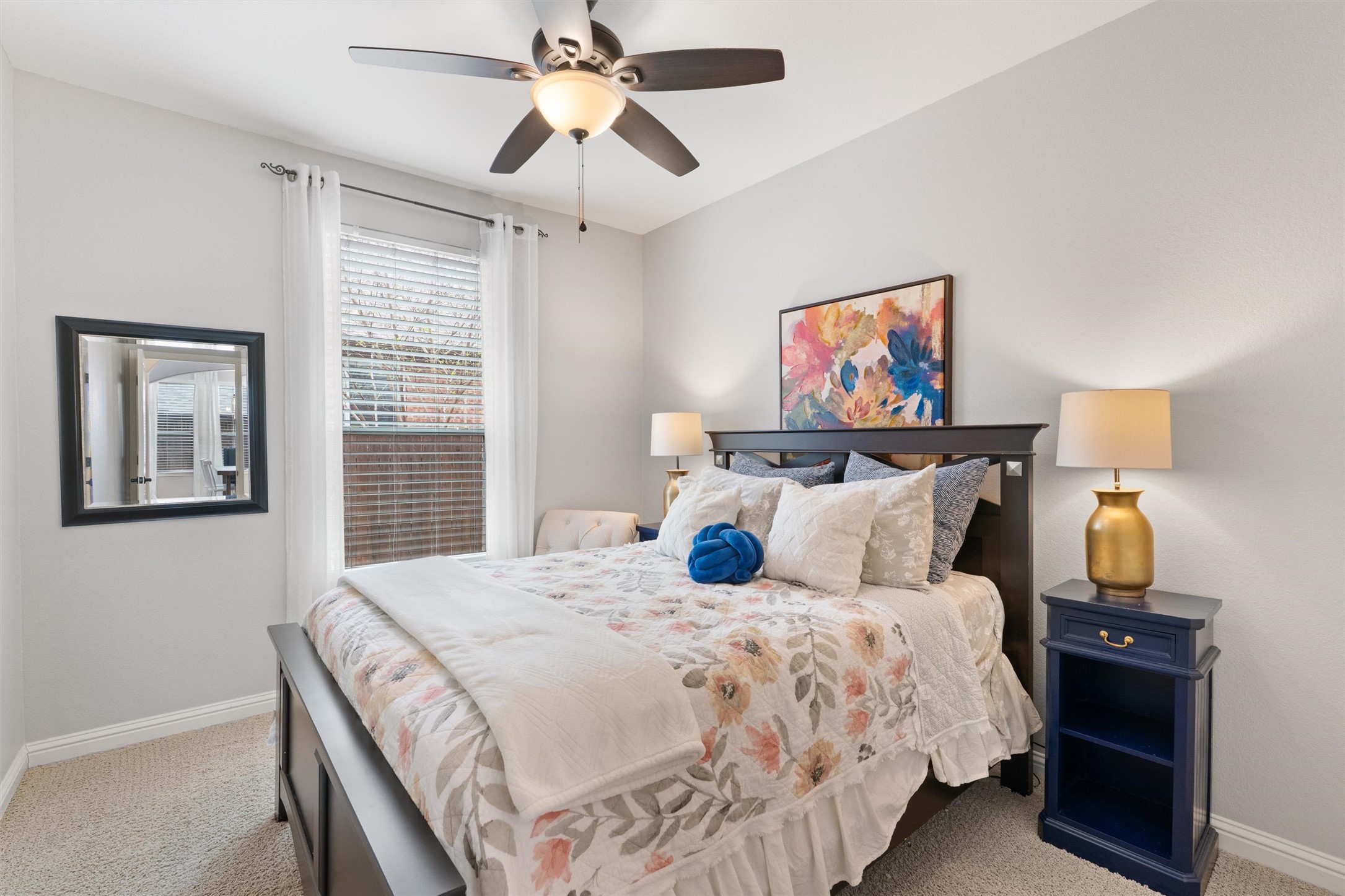 144 Copper Lake Lane Georgetown, TX 78628 - Photo 17 of 39 a bedroom with bed and window