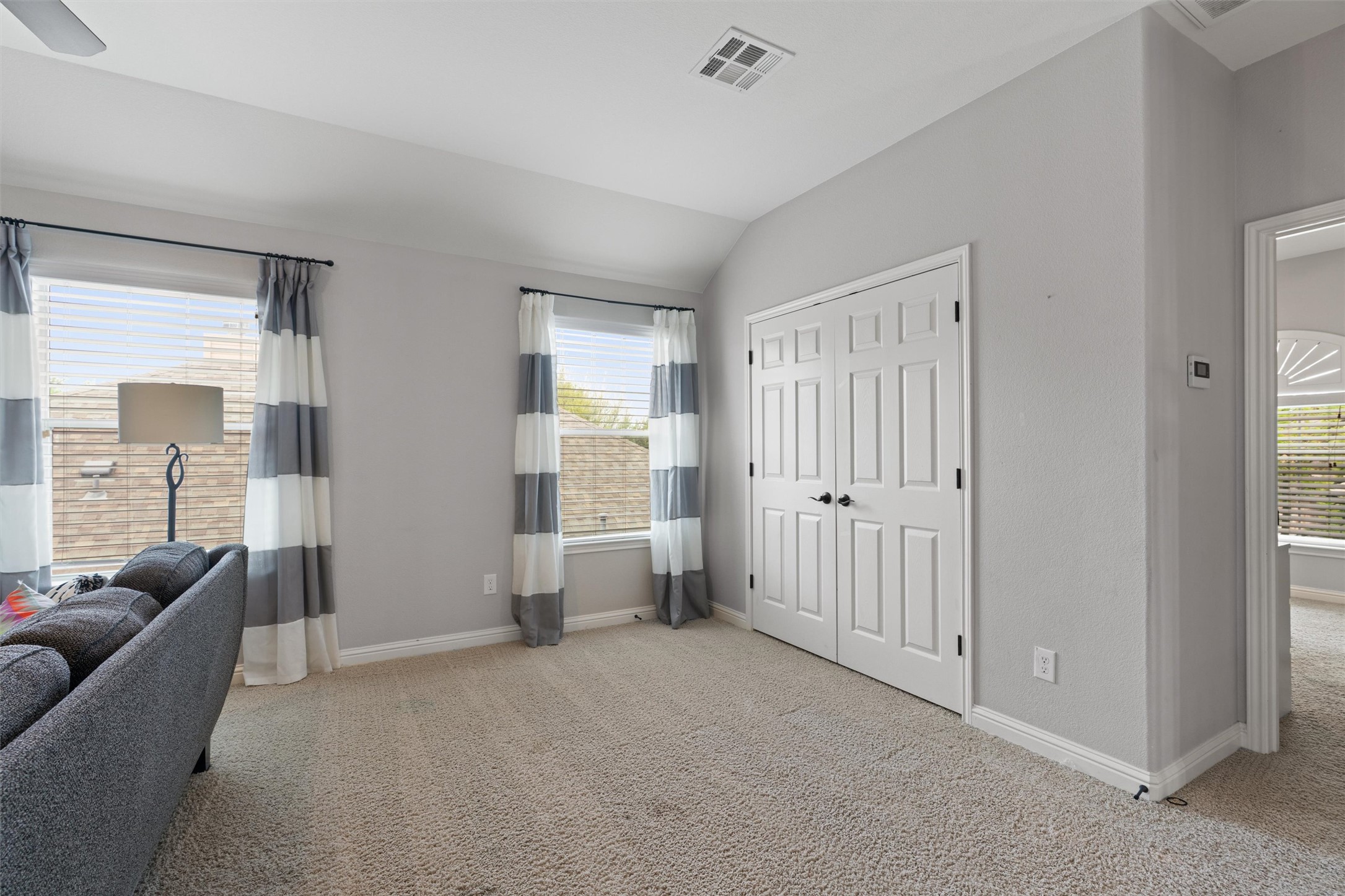 144 Copper Lake Lane Georgetown, TX 78628 - Photo 21 of 39 a view of a livingroom with furniture and windows