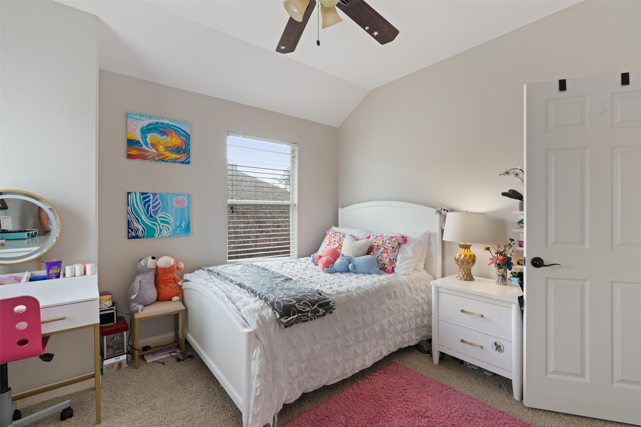 144 Copper Lake Lane Georgetown, TX 78628 - Photo 25 of 39 a bedroom with a bed and a dresser