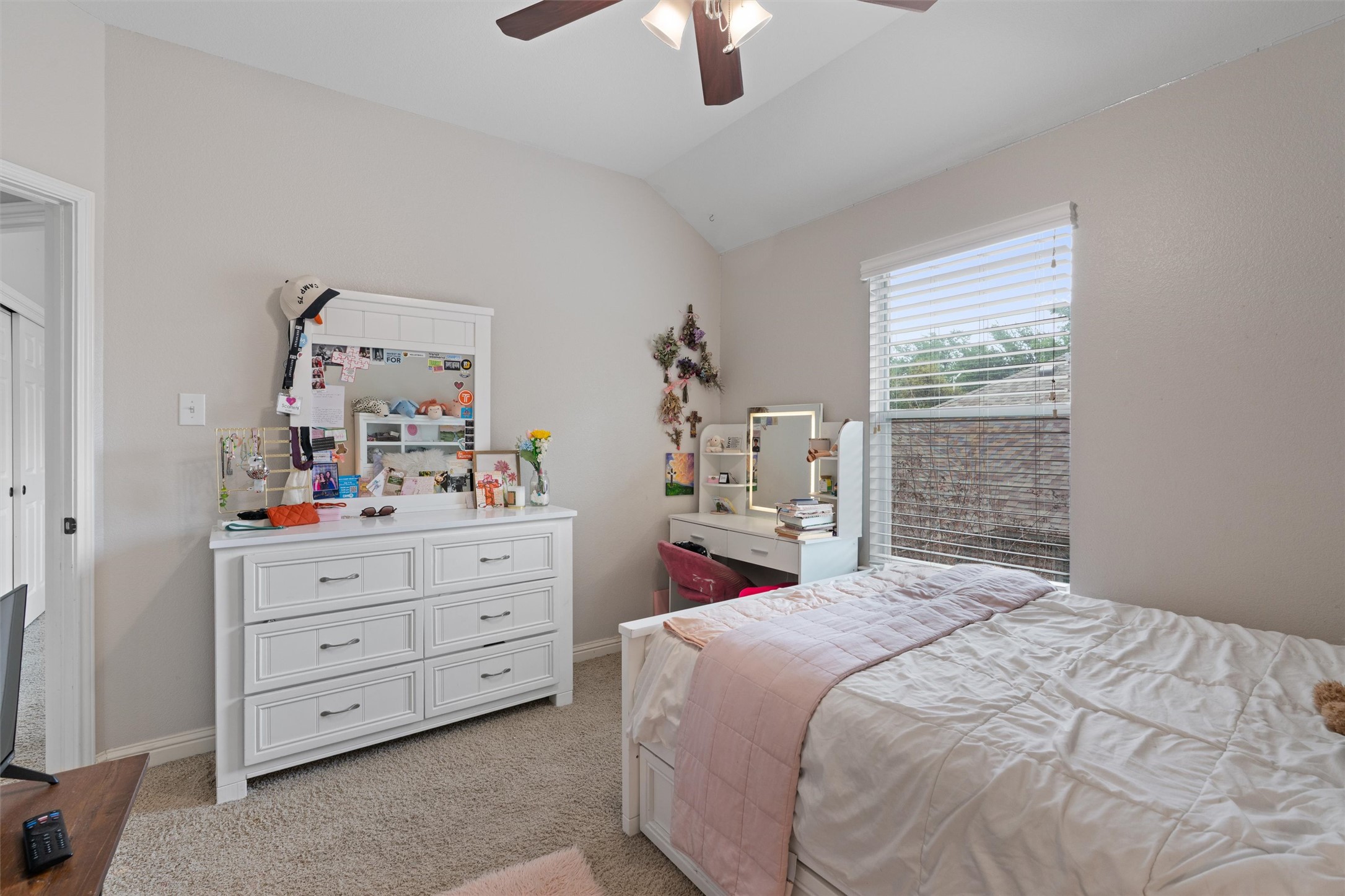 144 Copper Lake Lane Georgetown, TX 78628 - Photo 27 of 39 a bedroom with a bed and a window