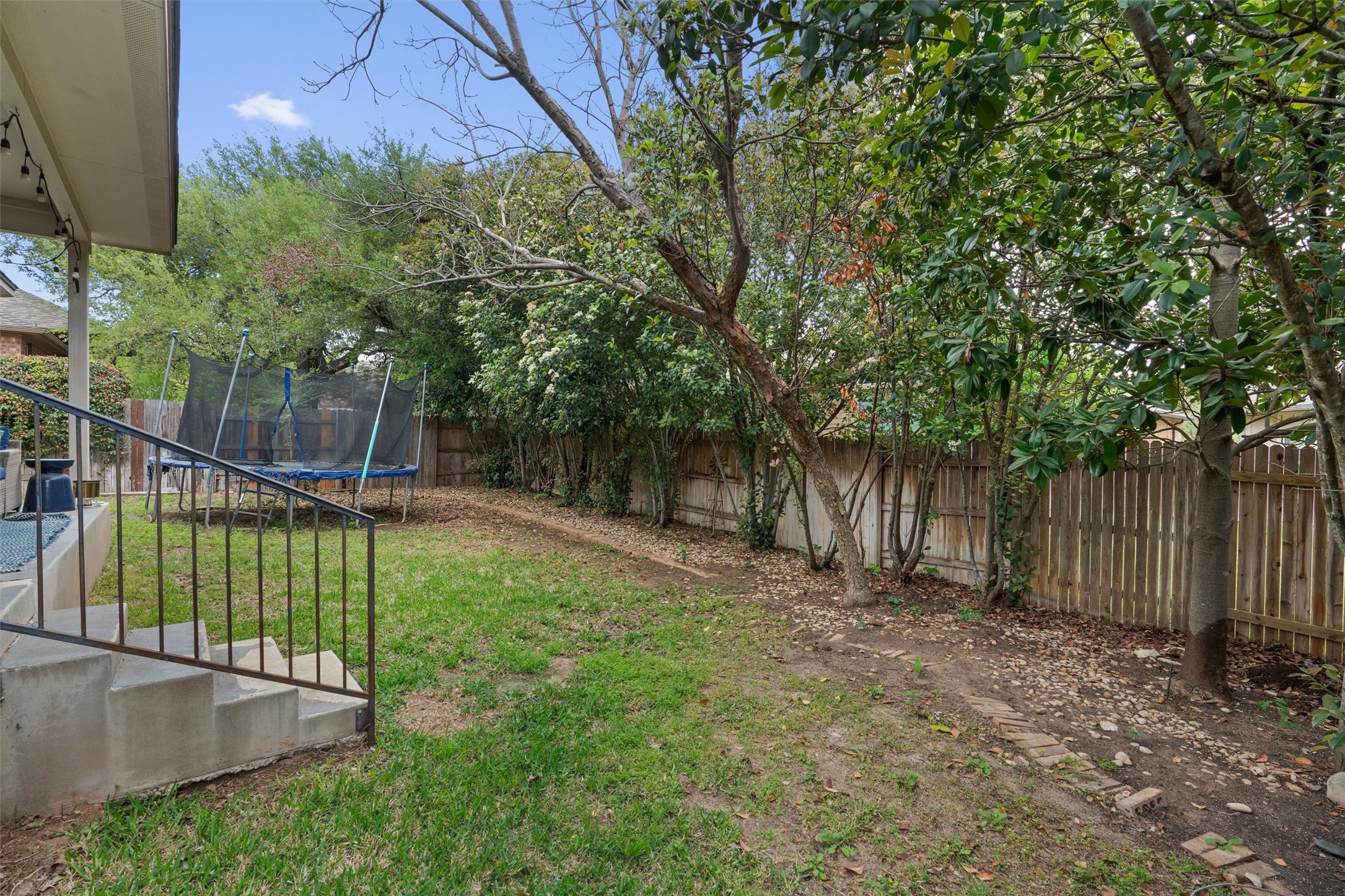 144 Copper Lake Lane Georgetown, TX 78628 - Photo 31 of 39 a view of a backyard with a small cabin