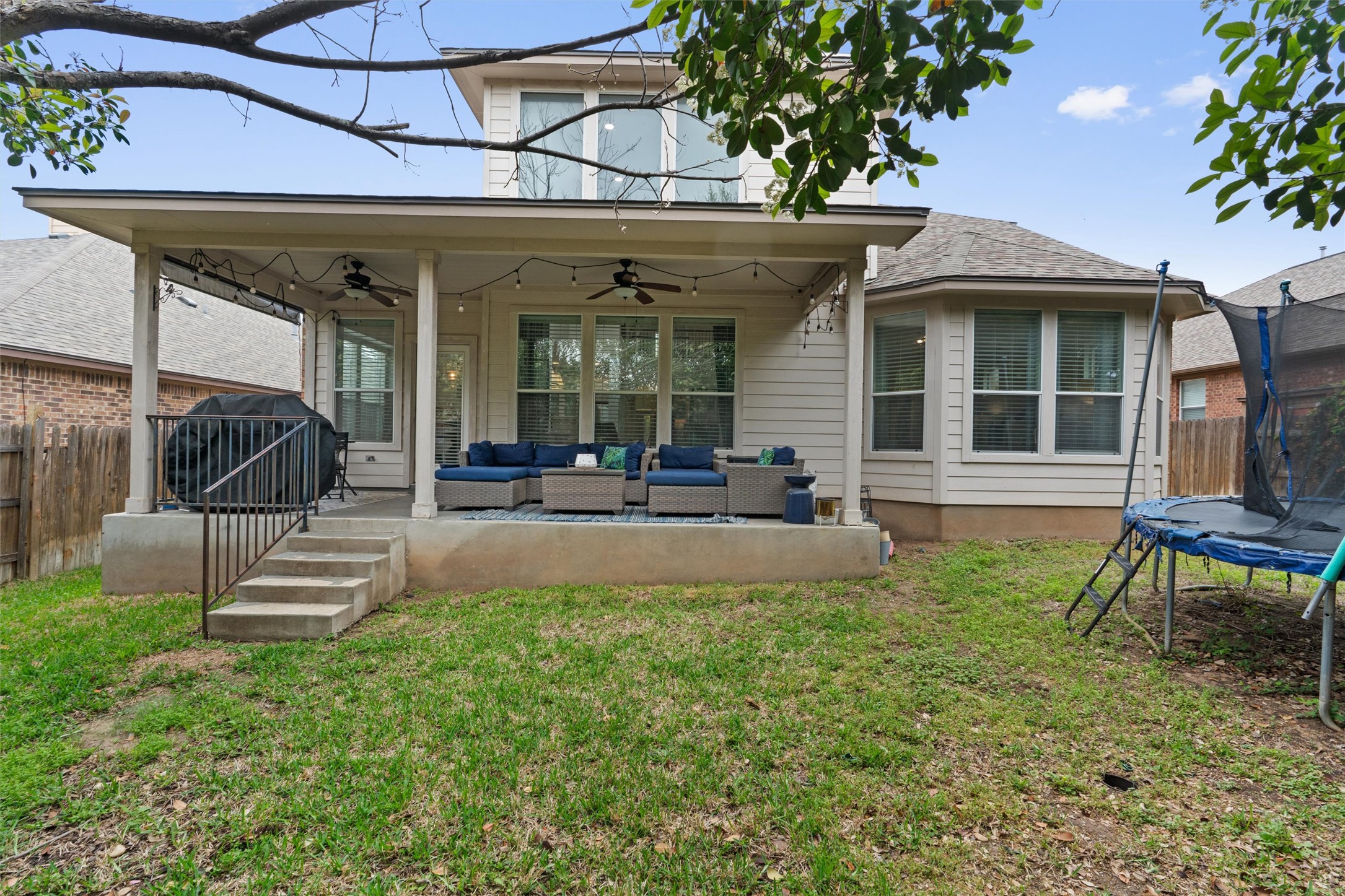 144 Copper Lake Lane Georgetown, TX 78628 - Photo 32 of 39 a view of a house with a yard porch and sitting area