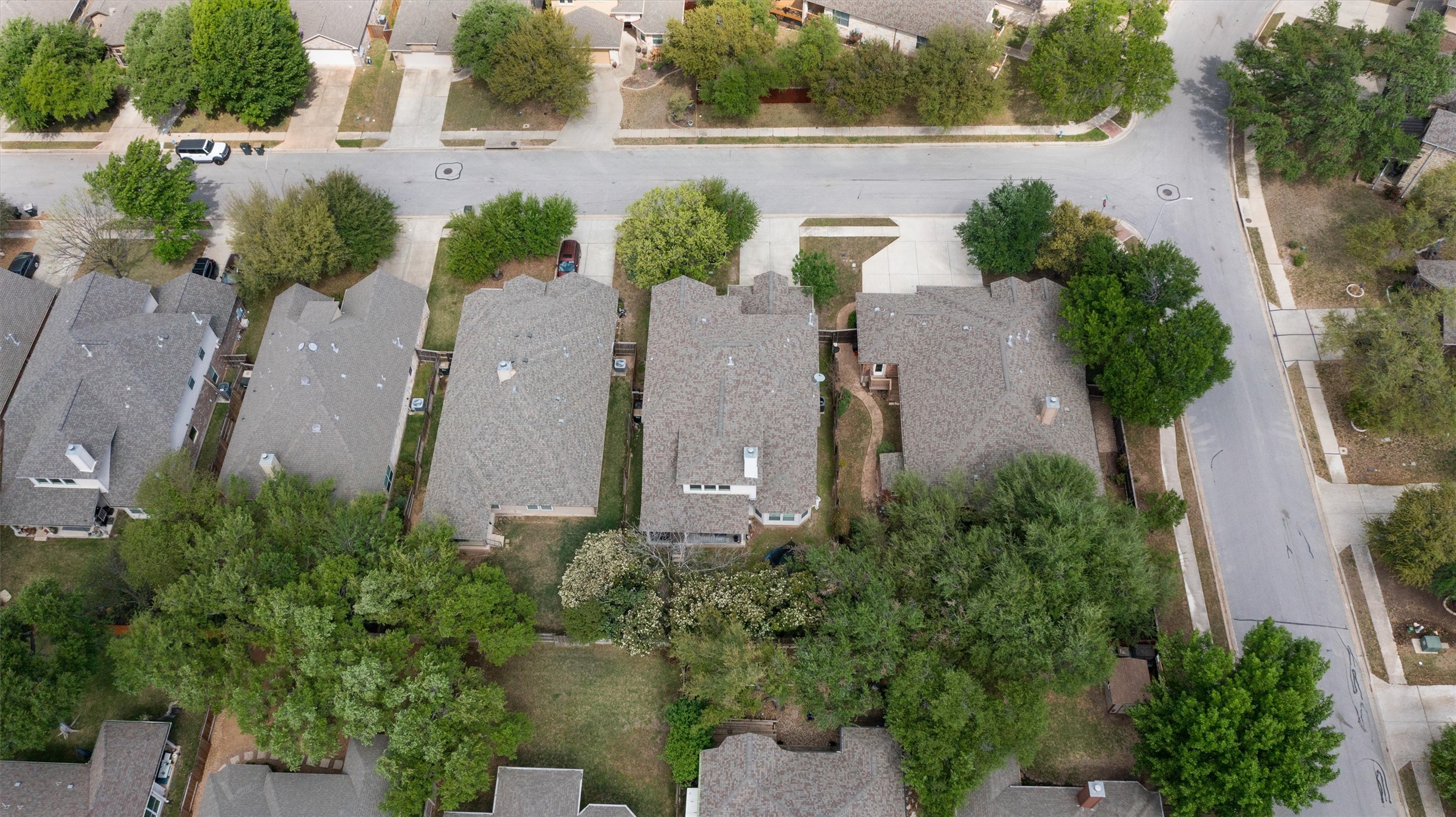 144 Copper Lake Lane Georgetown, TX 78628 - Photo 33 of 39 an aerial view of a house with garden space and lake view