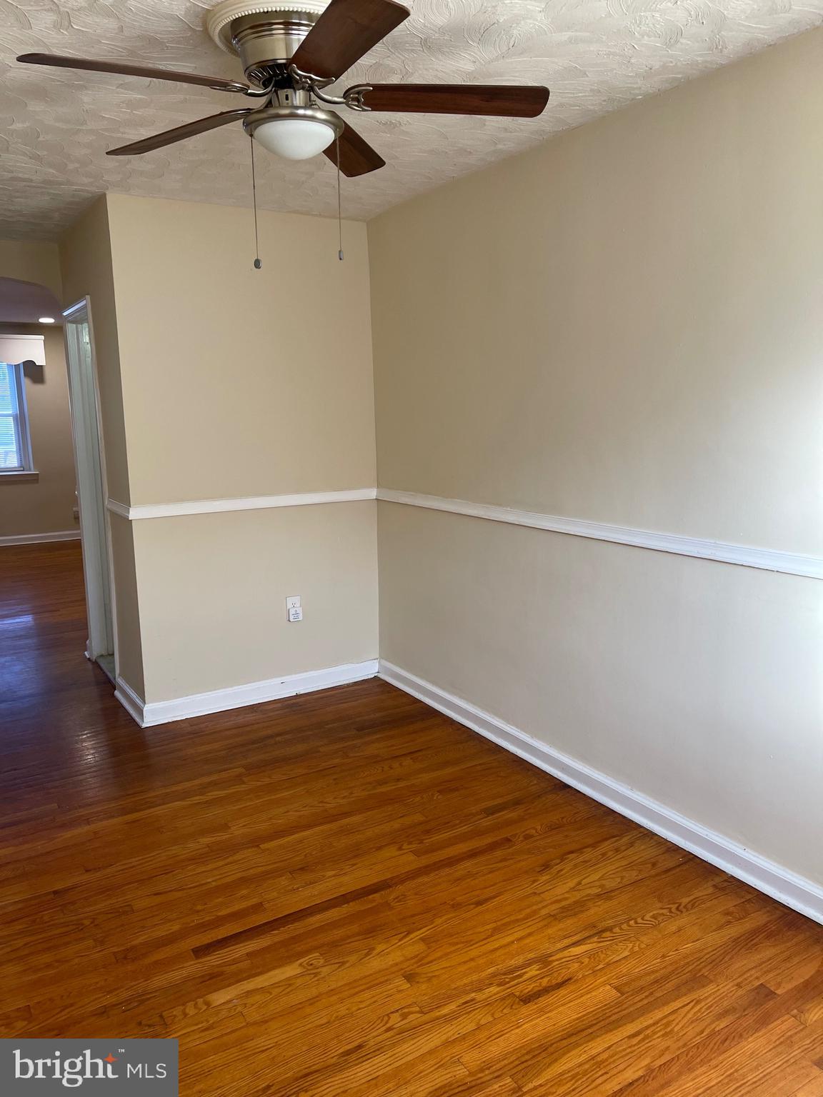 222 West Colonial Street Philadelphia, PA 19126 - Photo 3 of 18 a view of an empty room with wooden floor