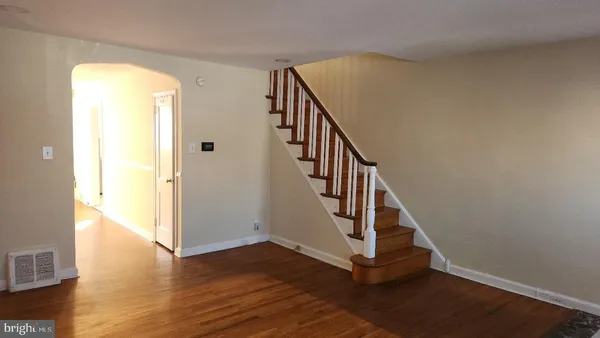 a view of entryway with wooden floor