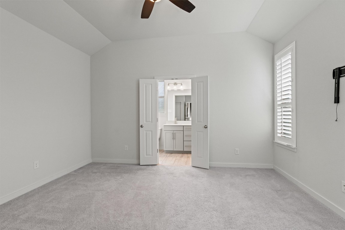 2500 Forest Creek Drive, Unit 302 Round Rock, TX 78665 - Photo 12 of 27 an empty room with windows and closet