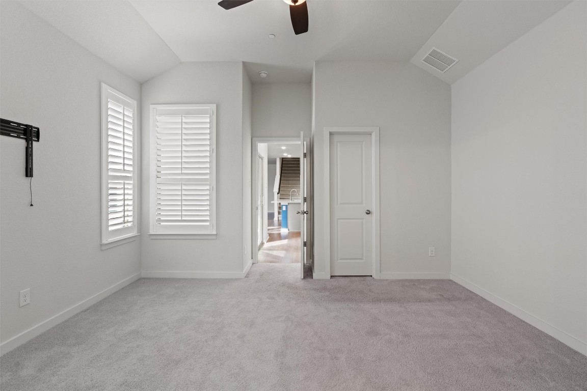 2500 Forest Creek Drive, Unit 302 Round Rock, TX 78665 - Photo 13 of 27 an empty room with windows and entrance