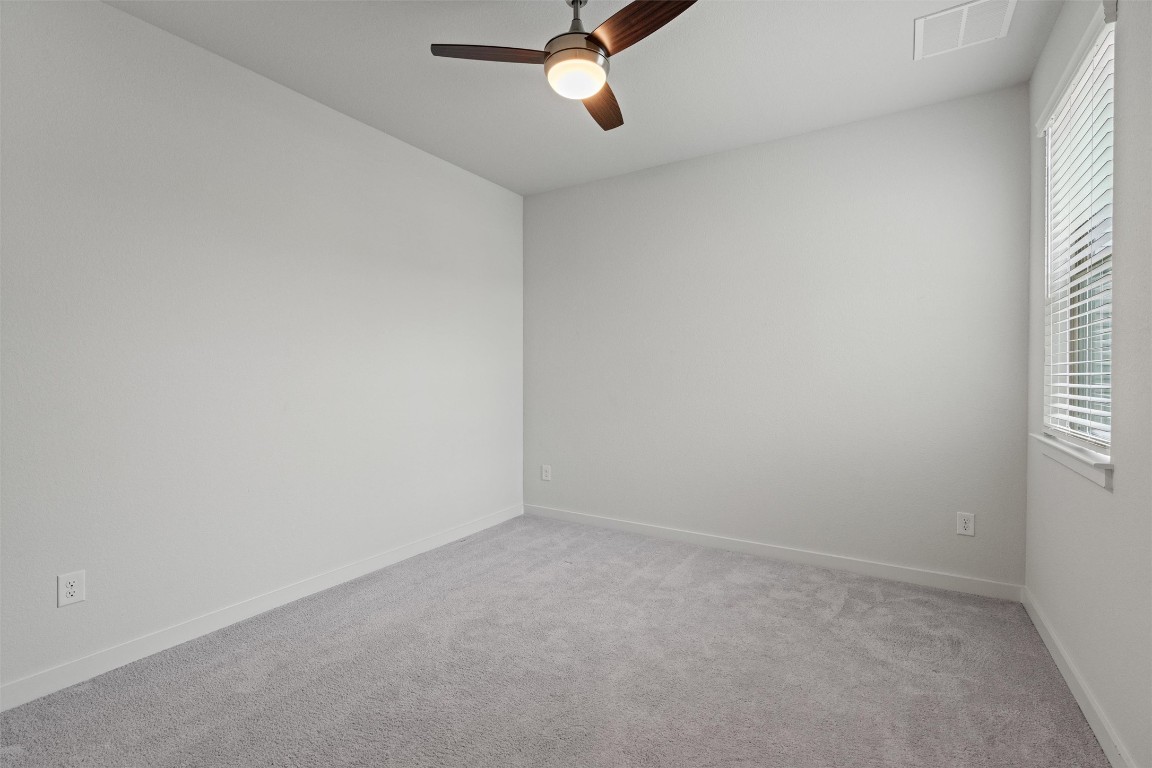 2500 Forest Creek Drive, Unit 302 Round Rock, TX 78665 - Photo 17 of 27 an empty room with a window