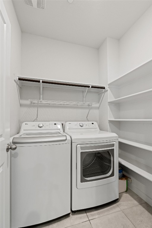 2500 Forest Creek Drive, Unit 302 Round Rock, TX 78665 - Photo 10 of 27 a utility room with dryer and washer