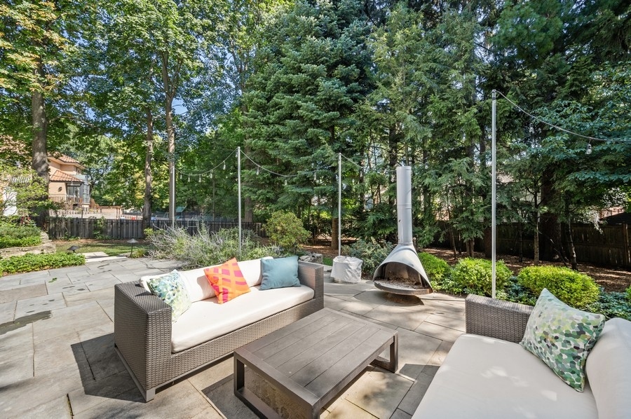 505 Ridge Road Kenilworth, IL 60043 - Photo 26 of 26 a view of backyard with seating area and green space