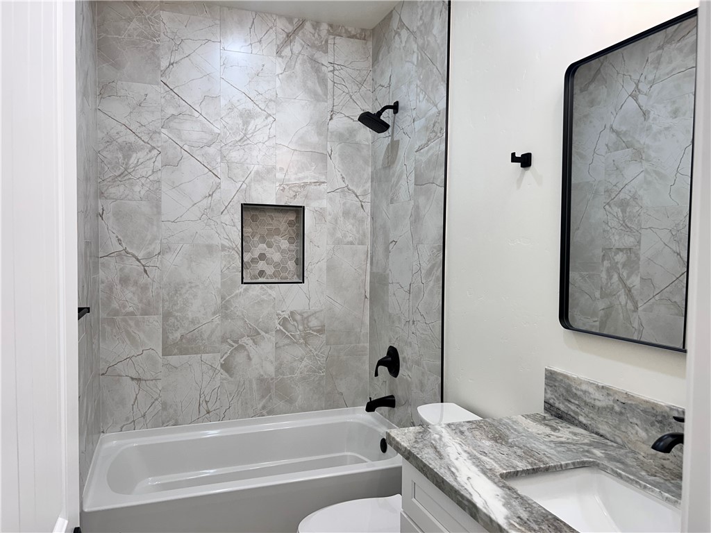 1266 Wilson Road Bullhead City, AZ 86442 - Photo 15 of 29 Bathroom featuring shower / tub combination and vanity