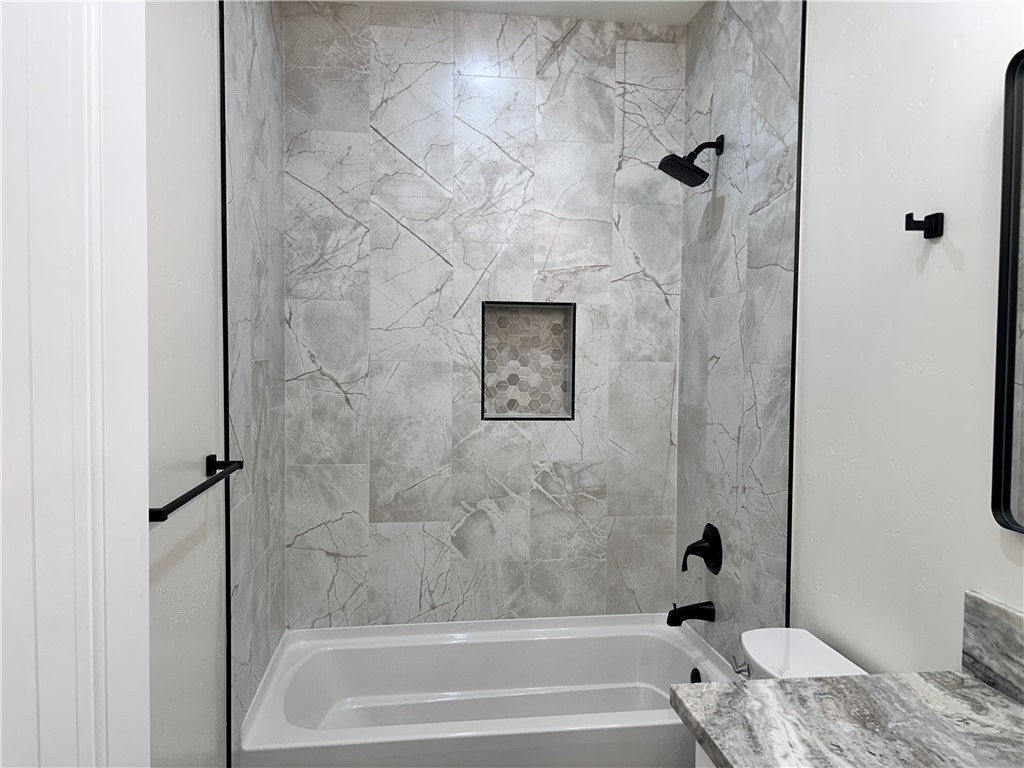 1266 Wilson Road Bullhead City, AZ 86442 - Photo 16 of 29 Bathroom with vanity and shower combination