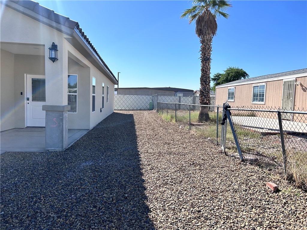 1266 Wilson Road Bullhead City, AZ 86442 - Photo 25 of 29 View of fenced backyard