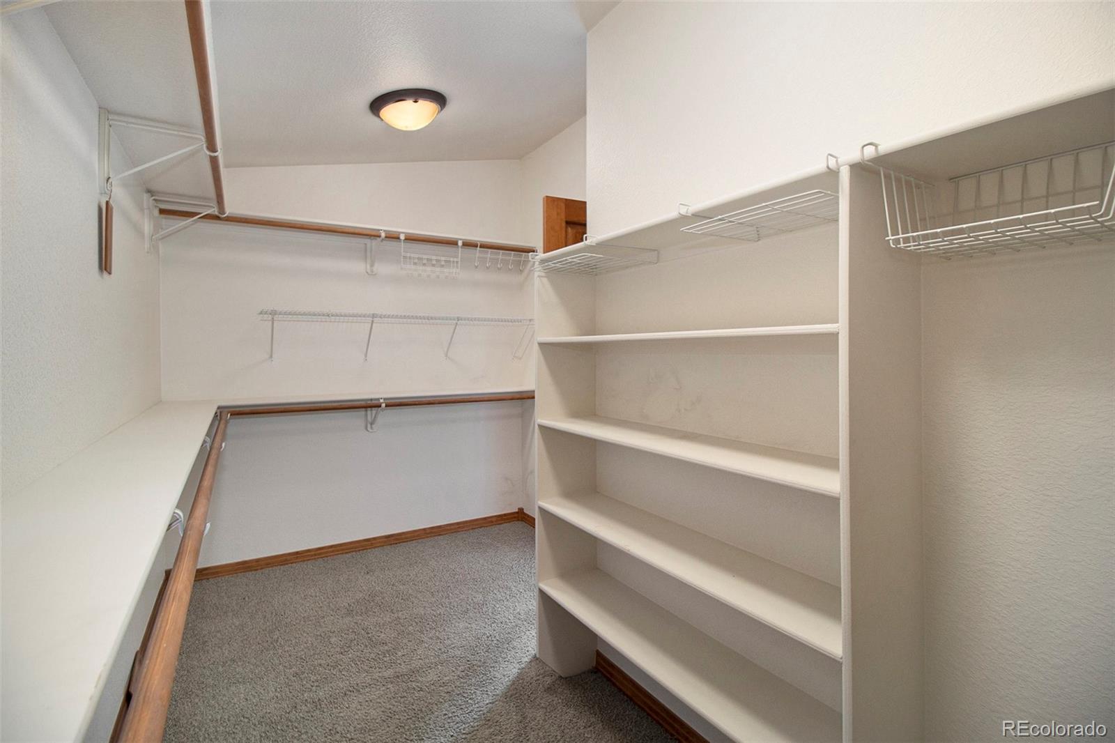 43 Forest Ridge Circle Bailey, CO 80421 - Photo 21 of 43 a view of an empty walk in closet