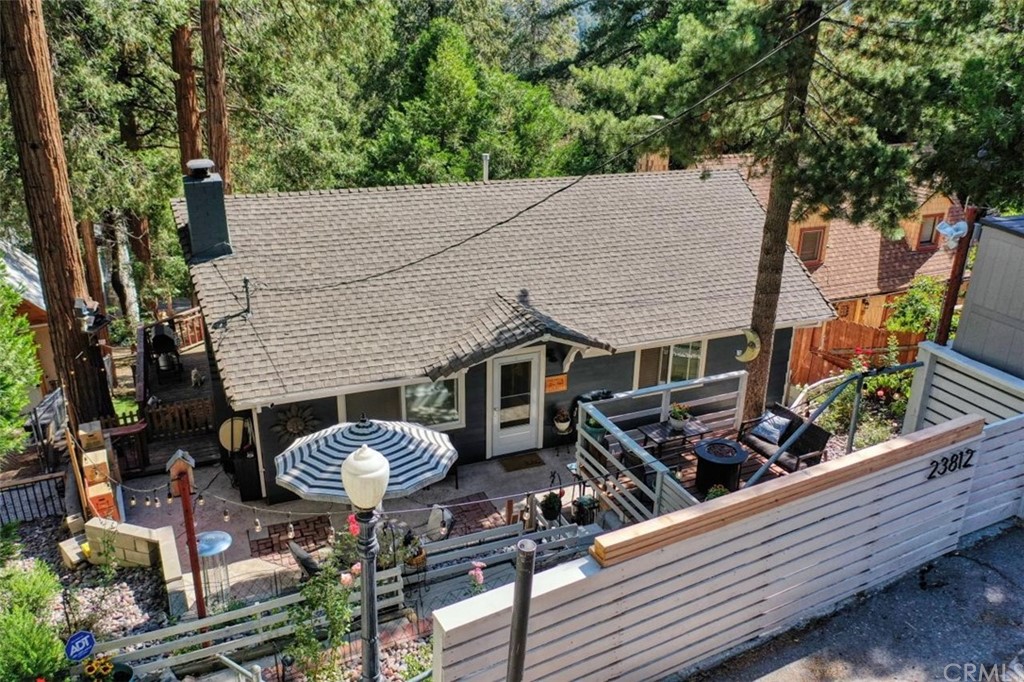 23812 Bowl Road Crestline, CA 92325 - Photo 1 of 1 an outdoor view of house with outdoor seating