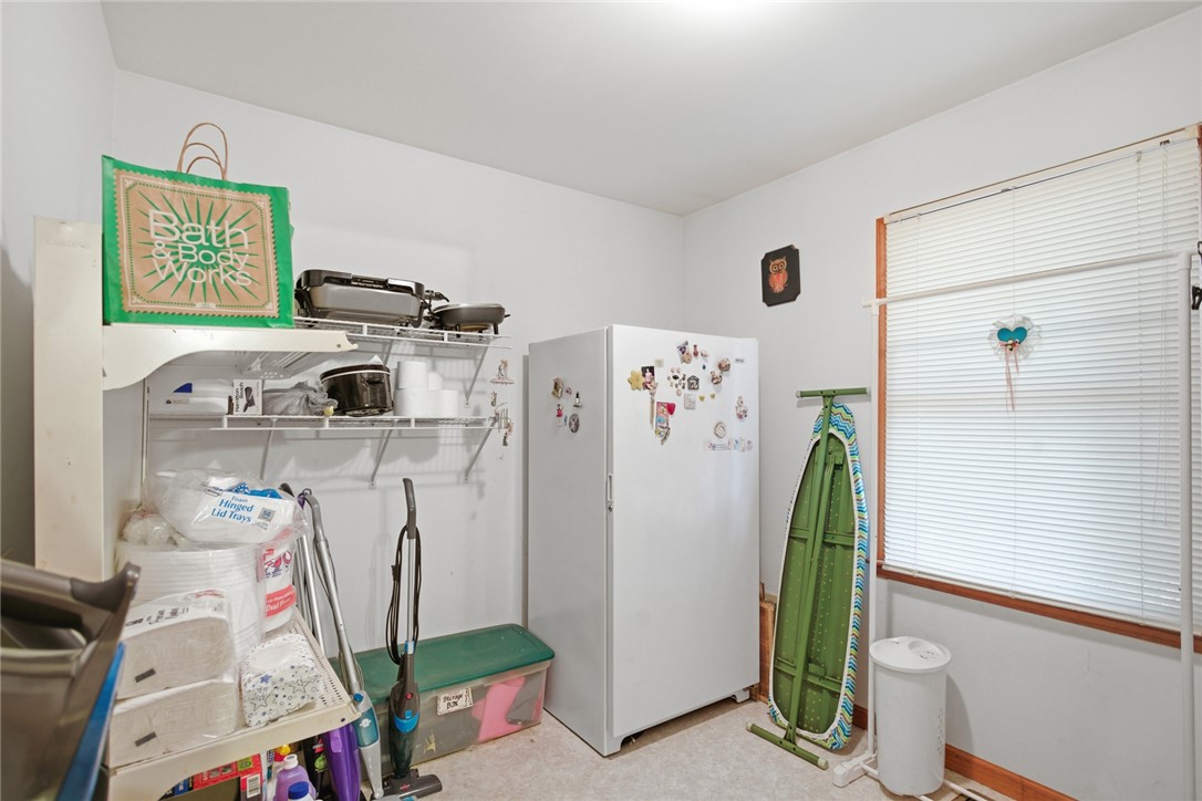282 West Bennett Road Westminster, SC 29693 - Photo 27 of 42 This versatile utility room provides ample storage and practical amenities for daily chores.