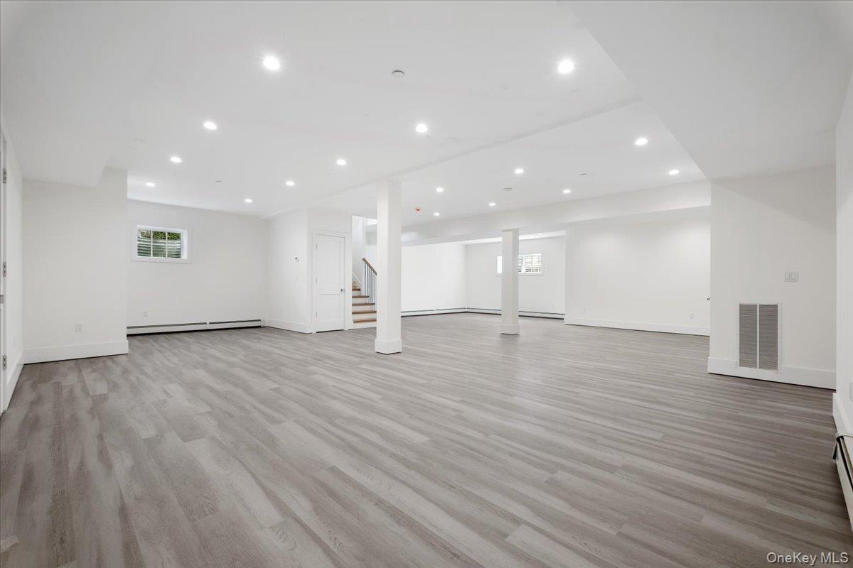 8 Dell Road Scarsdale, NY 10583 - Photo 33 of 41 a view of empty room with wooden floor