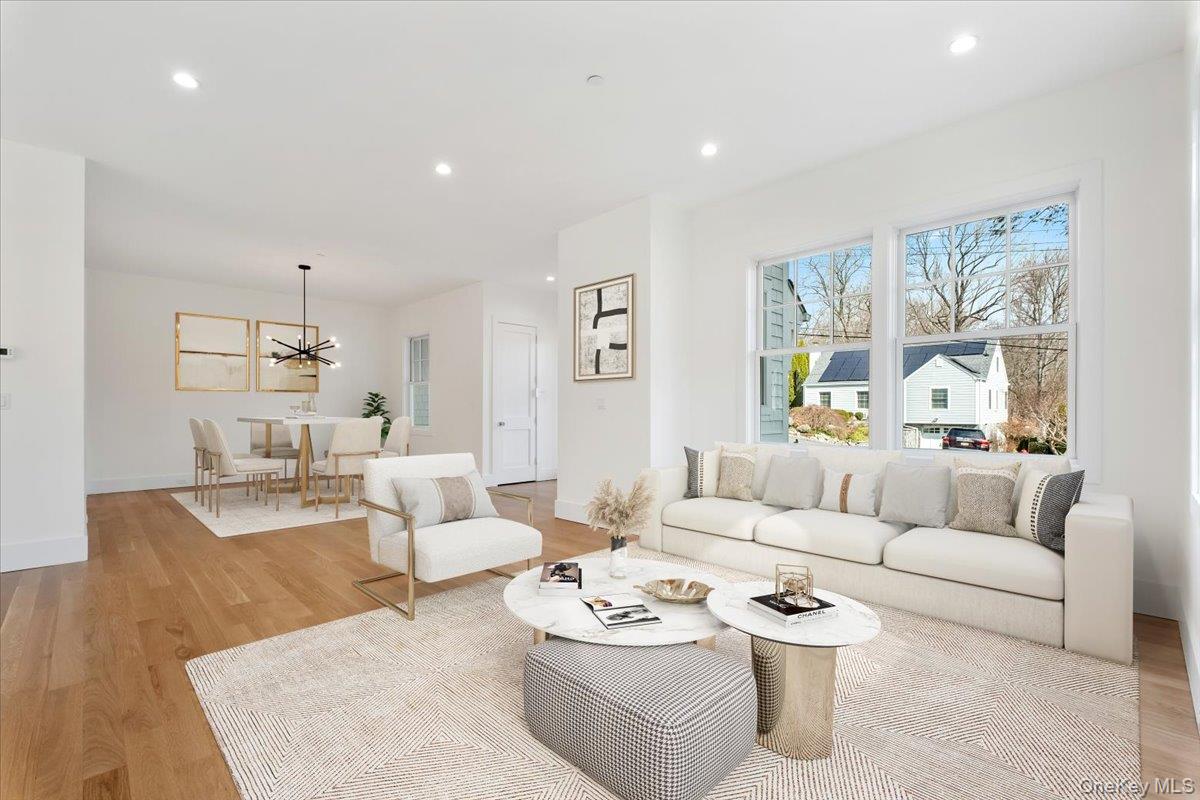 8 Dell Road Scarsdale, NY 10583 - Photo 6 of 41 a living room with furniture and a large window