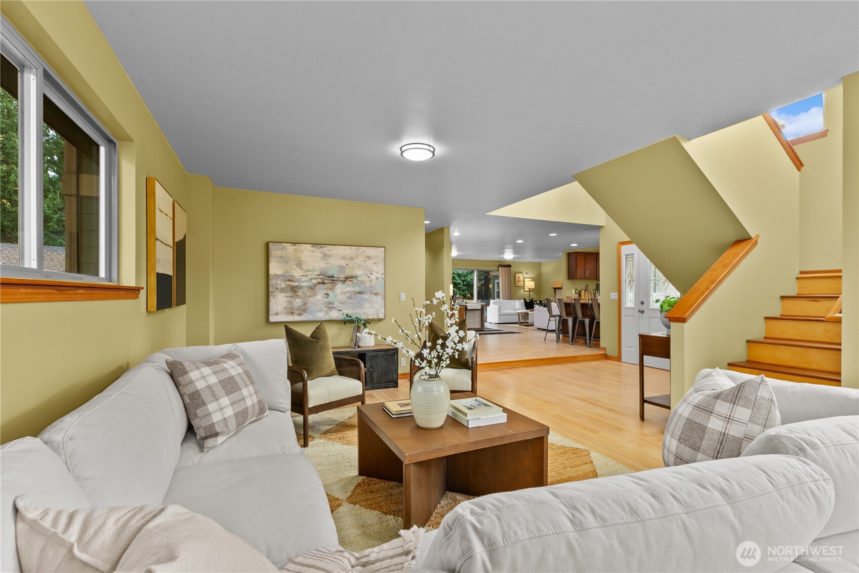 14808 84th Avenue Northeast Kenmore, WA 98028 - Photo 11 of 40 a living room with furniture and a large window