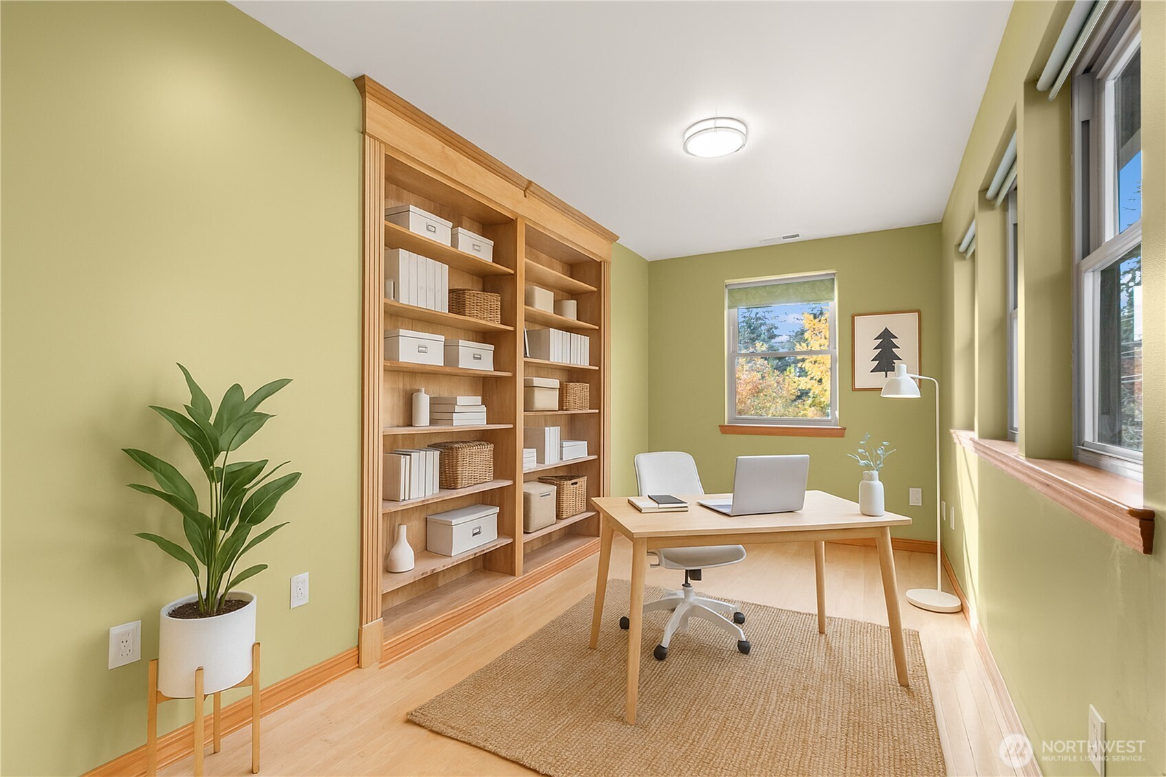 14808 84th Avenue Northeast Kenmore, WA 98028 - Photo 22 of 40 a living room with furniture and a potted plant