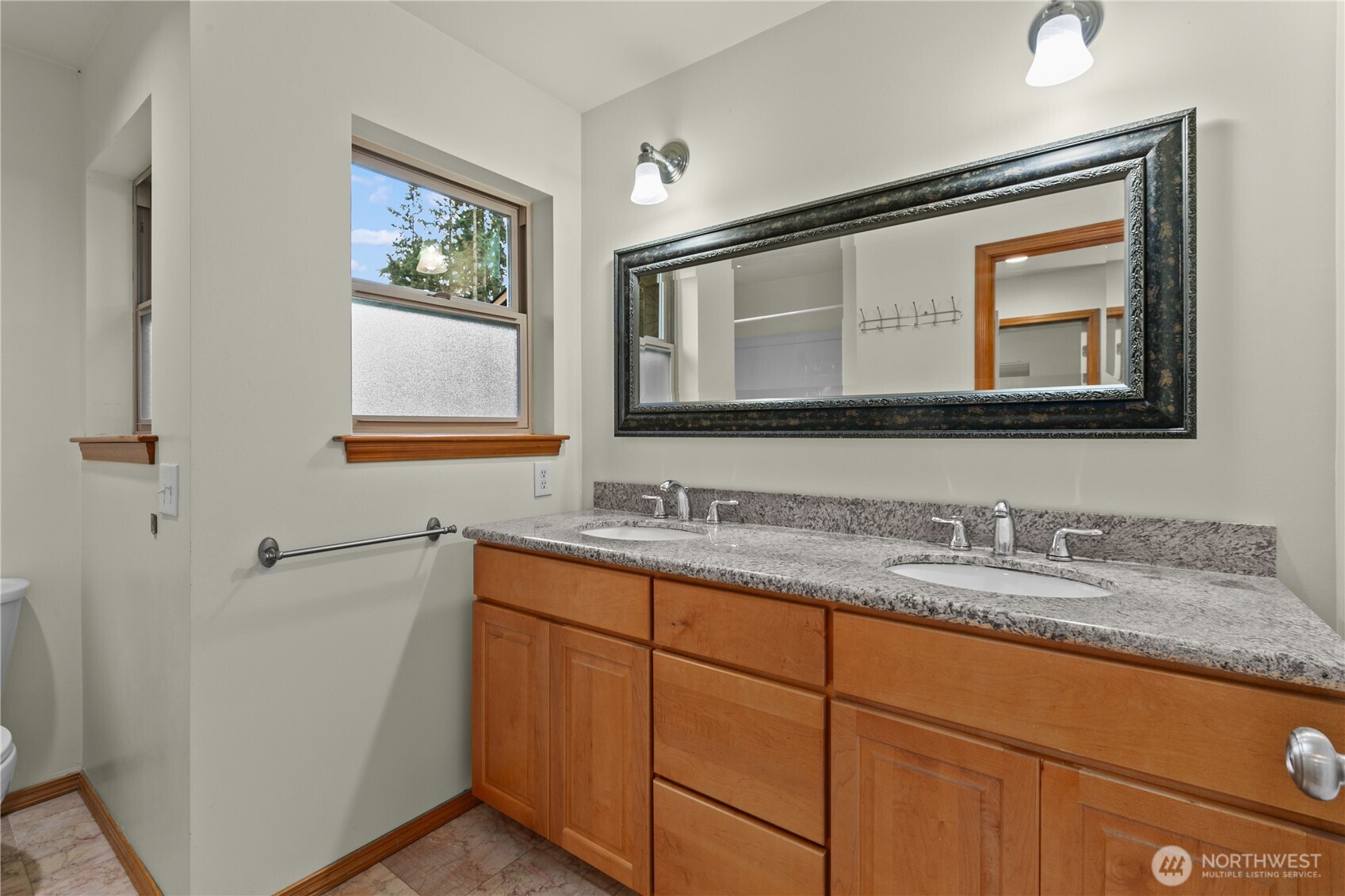 14808 84th Avenue Northeast Kenmore, WA 98028 - Photo 35 of 40 a bathroom with 2 sink and a mirror