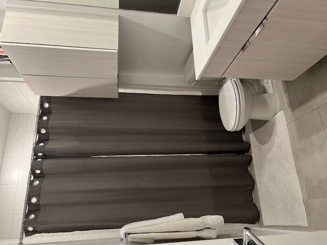 4802 South Congress Avenue, Unit 121 Austin, TX 78745 - Photo 12 of 38 a bathroom with a sink and a toilet