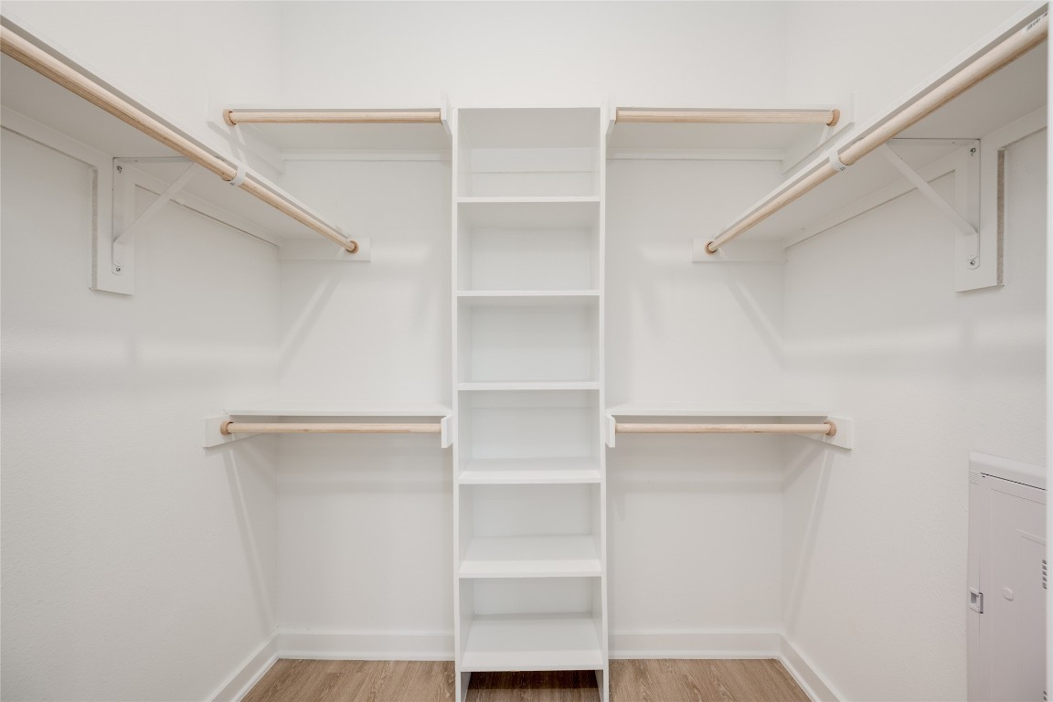 4802 South Congress Avenue, Unit 121 Austin, TX 78745 - Photo 5 of 38 a view of walk in closet with empty racks