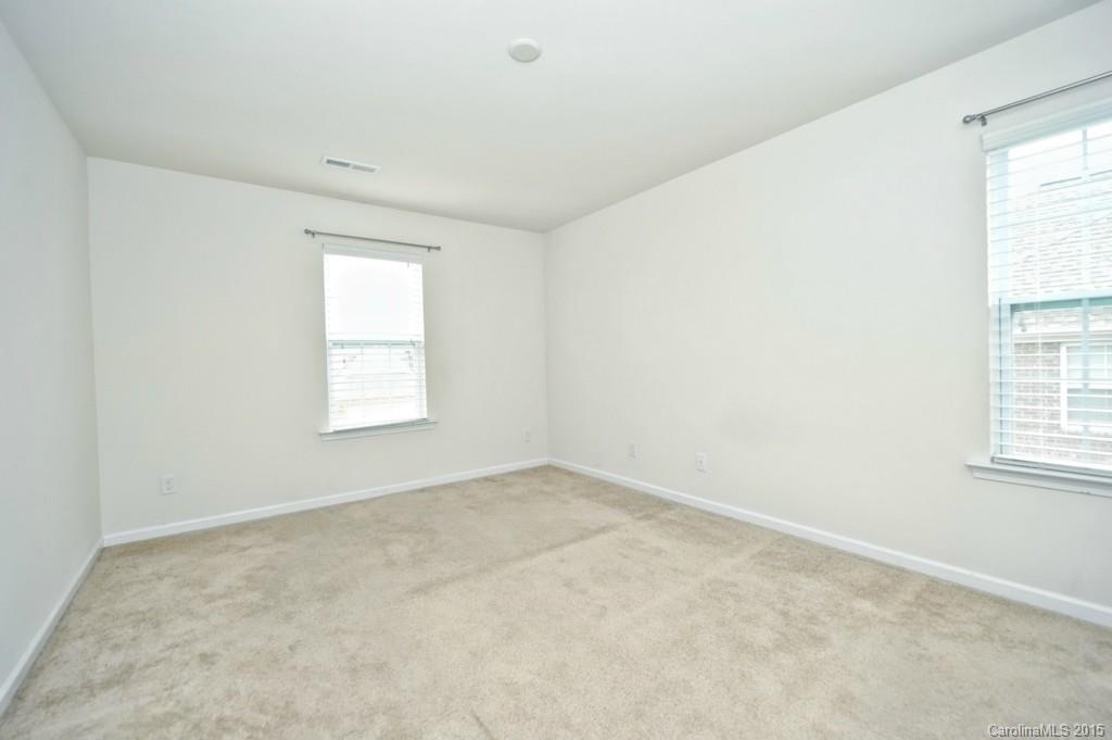 9927 Paxton Run Road Charlotte, NC 28277 - Photo 20 of 24 an empty room with a window
