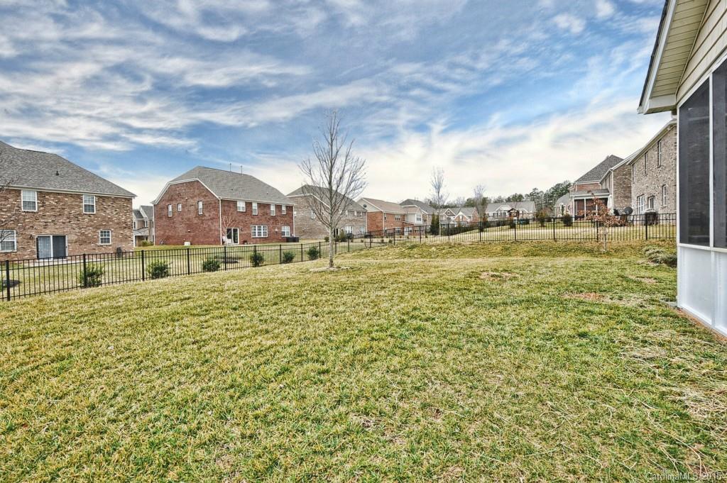 9927 Paxton Run Road Charlotte, NC 28277 - Photo 23 of 24 a view of a big yard with a house