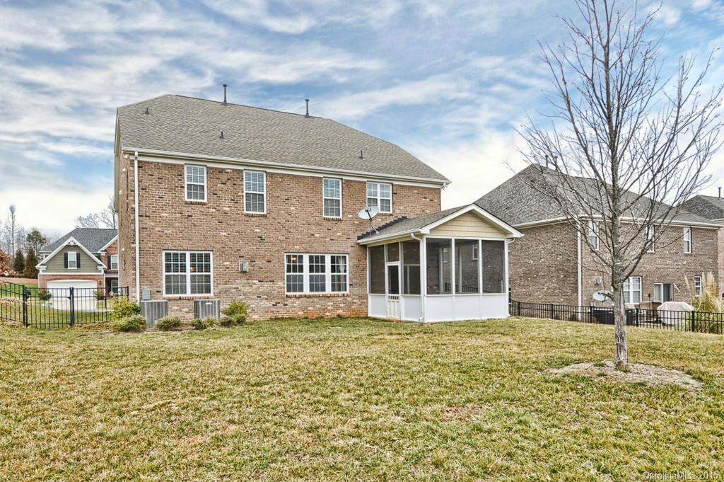 9927 Paxton Run Road Charlotte, NC 28277 - Photo 24 of 24 a front view of a house with a yard