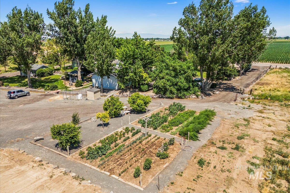 7425 Robinson Road Kuna, ID 83634 - Photo 9 of 50 Aerial view of sparsely populated area featuring extensive farmland