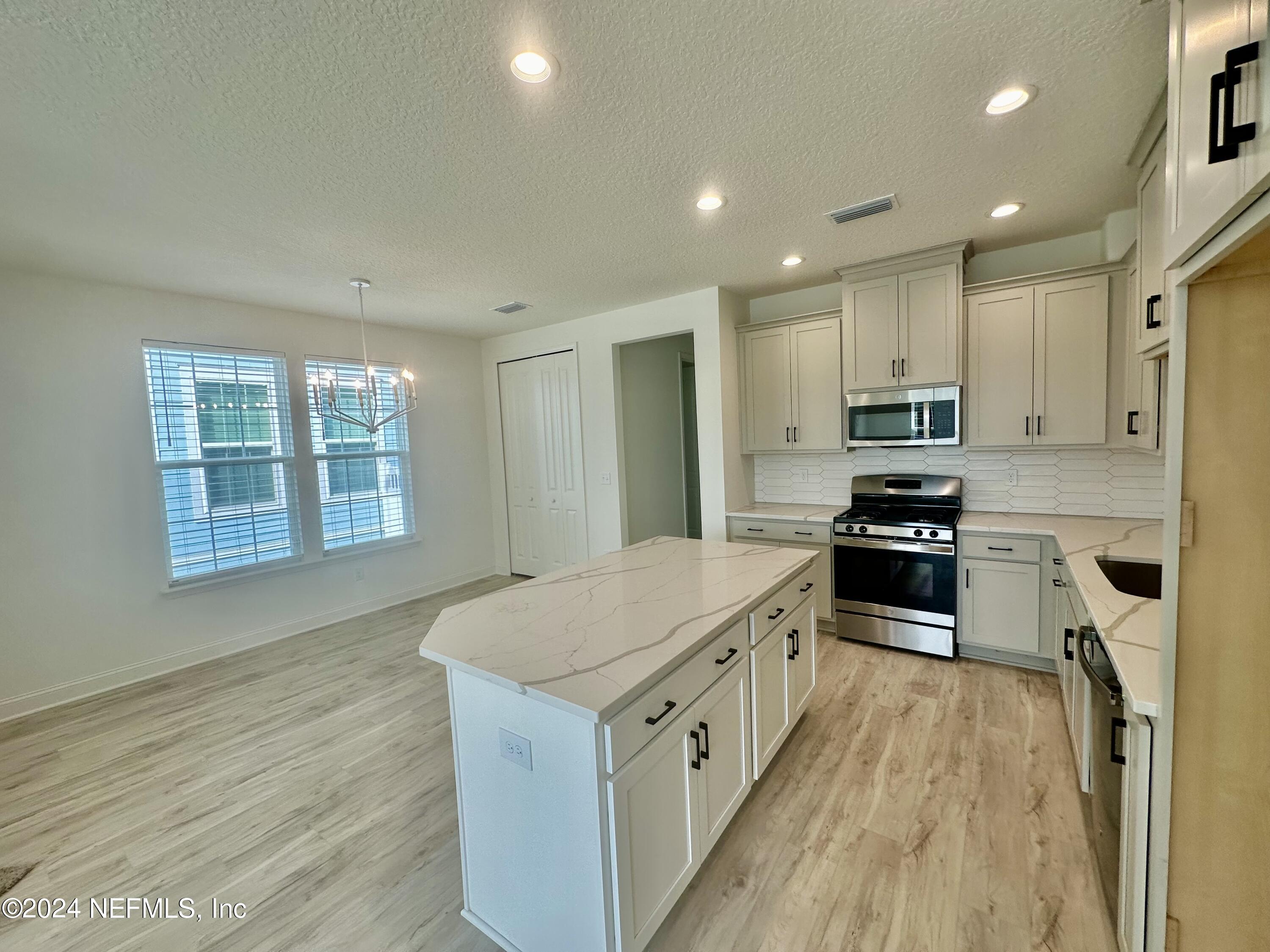 240 Wildlight Avenue Yulee, FL 32097 - Photo 9 of 11 IMG_3640