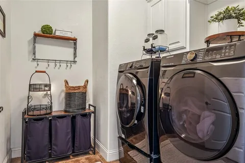 a bathroom with a sink mirror and vanity