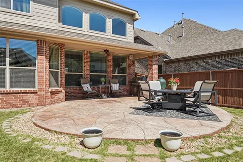 a view of a dinning tables and chairs in the patio