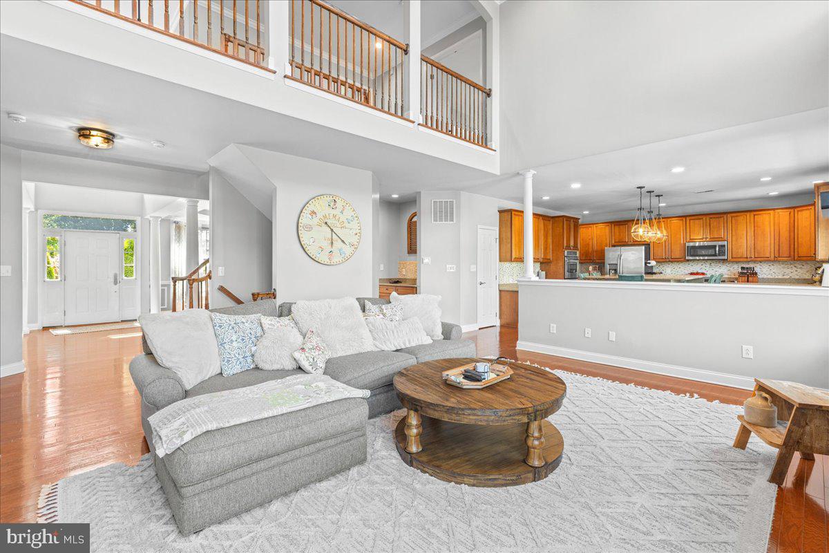 2650 Valhalla Road Vineland, NJ 08361 - Photo 16 of 49 a living room with furniture a clock and a view of kitchen
