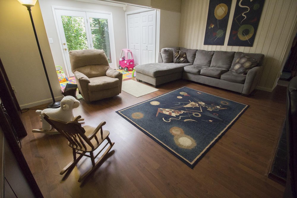 112 Delmar Circle Oak Ridge, TN 37830 - Photo 27 of 32 a living room with furniture rug and a large window