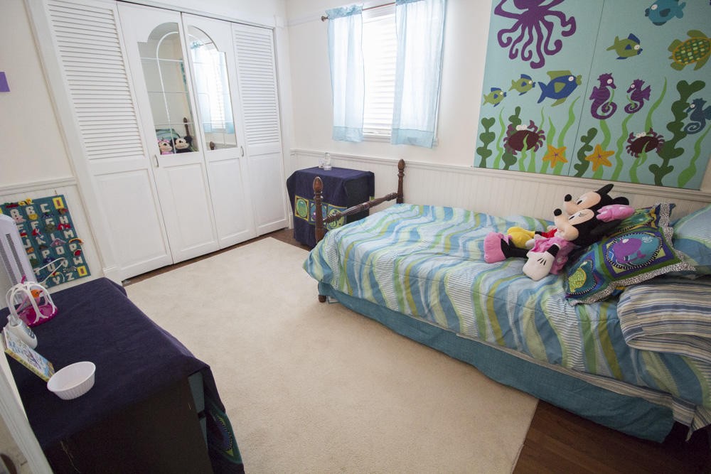 112 Delmar Circle Oak Ridge, TN 37830 - Photo 8 of 32 a bedroom with a bed and a window