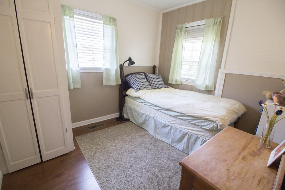 112 Delmar Circle Oak Ridge, TN 37830 - Photo 10 of 32 a bedroom with a bed and a window