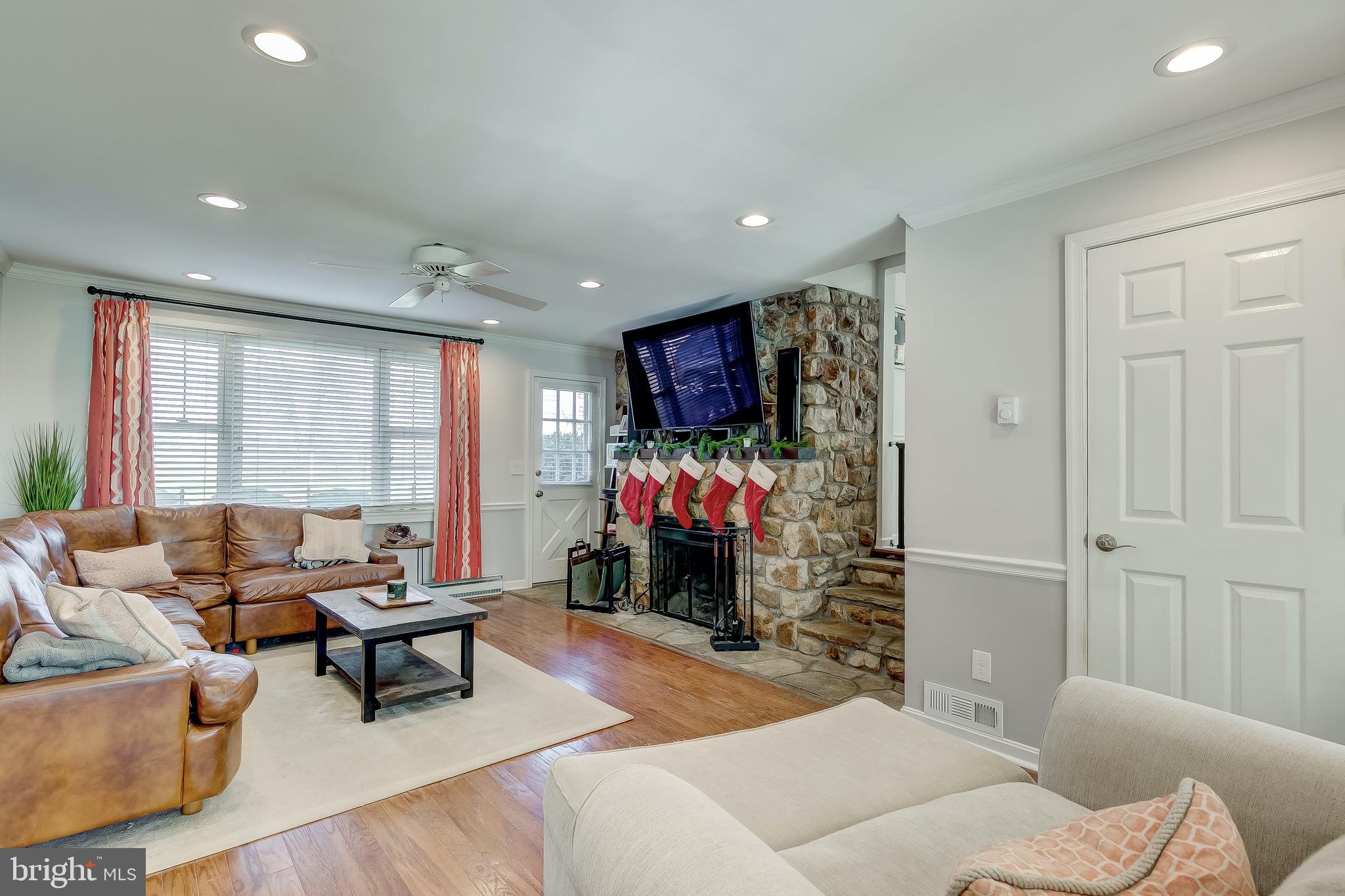 16353 Markoe Road Monkton, MD 21111 - Photo 30 of 96 Living room with wood burning stone fireplace