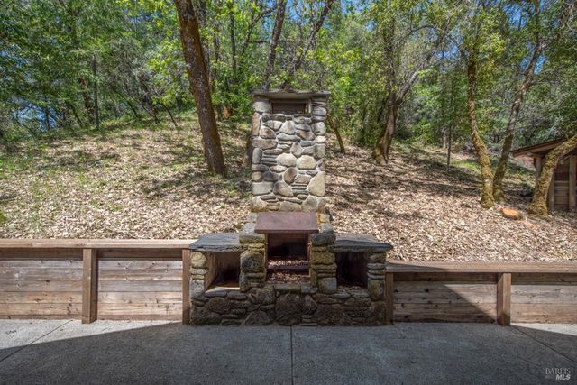a view of a bench in front of building