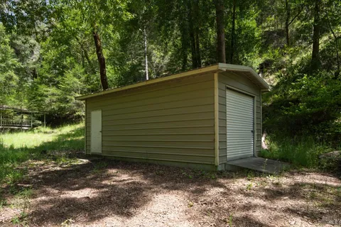 a view of swimming pool with a yard